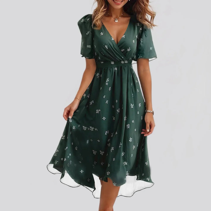 Sibyl | Elegante bloemenjurk met zwierige pasvorm