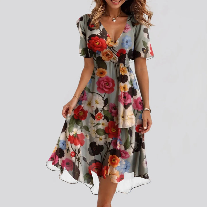 Sibyl | Elegante bloemenjurk met zwierige pasvorm