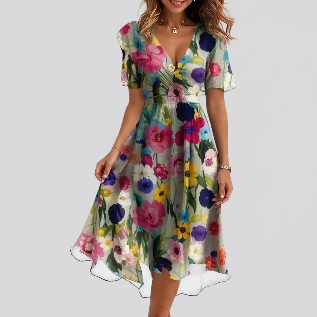 Sibyl | Elegante bloemenjurk met zwierige pasvorm